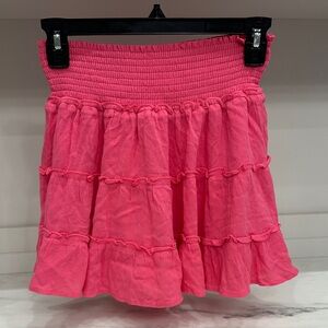 Pink Lily small Pink Tiered Smocked Waist Skort. Like new.